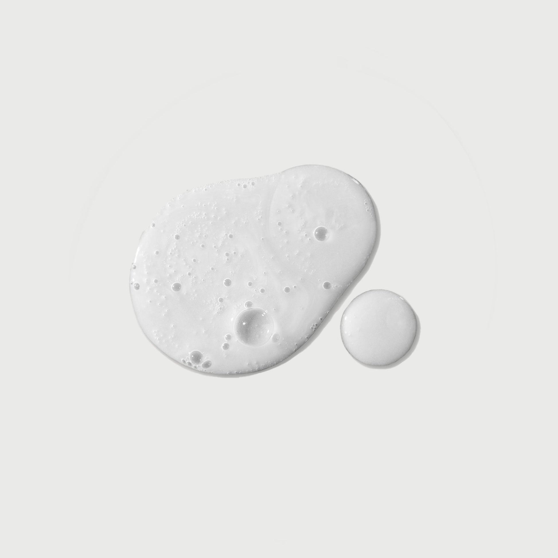 the-purifier-niacinamide-serum-body-wash-u2 NATR-40012-Swatch-The-Purifier-Niacinamide-Serum-Body-Wash-bonebkgd.jpg
